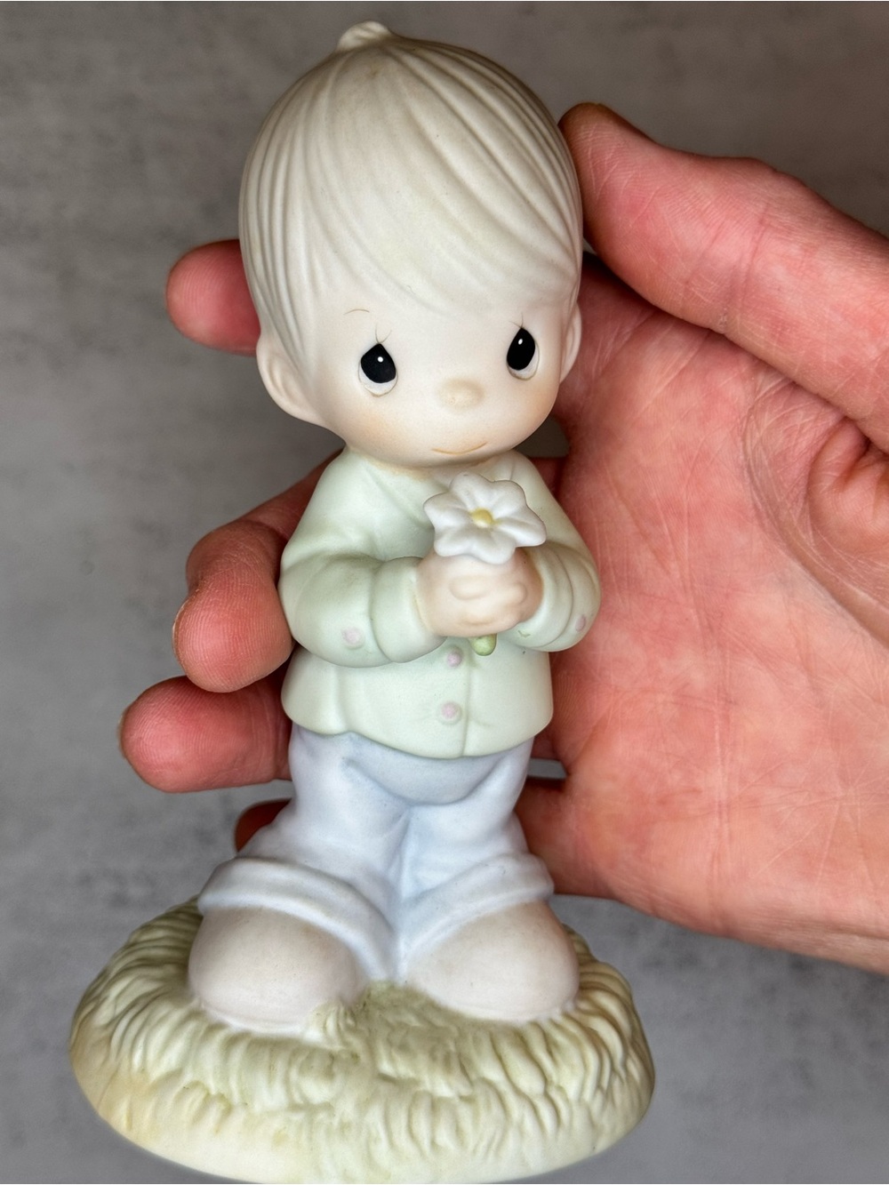 Precious Moments Boy Figurine in Mint Green and White Holding Flower